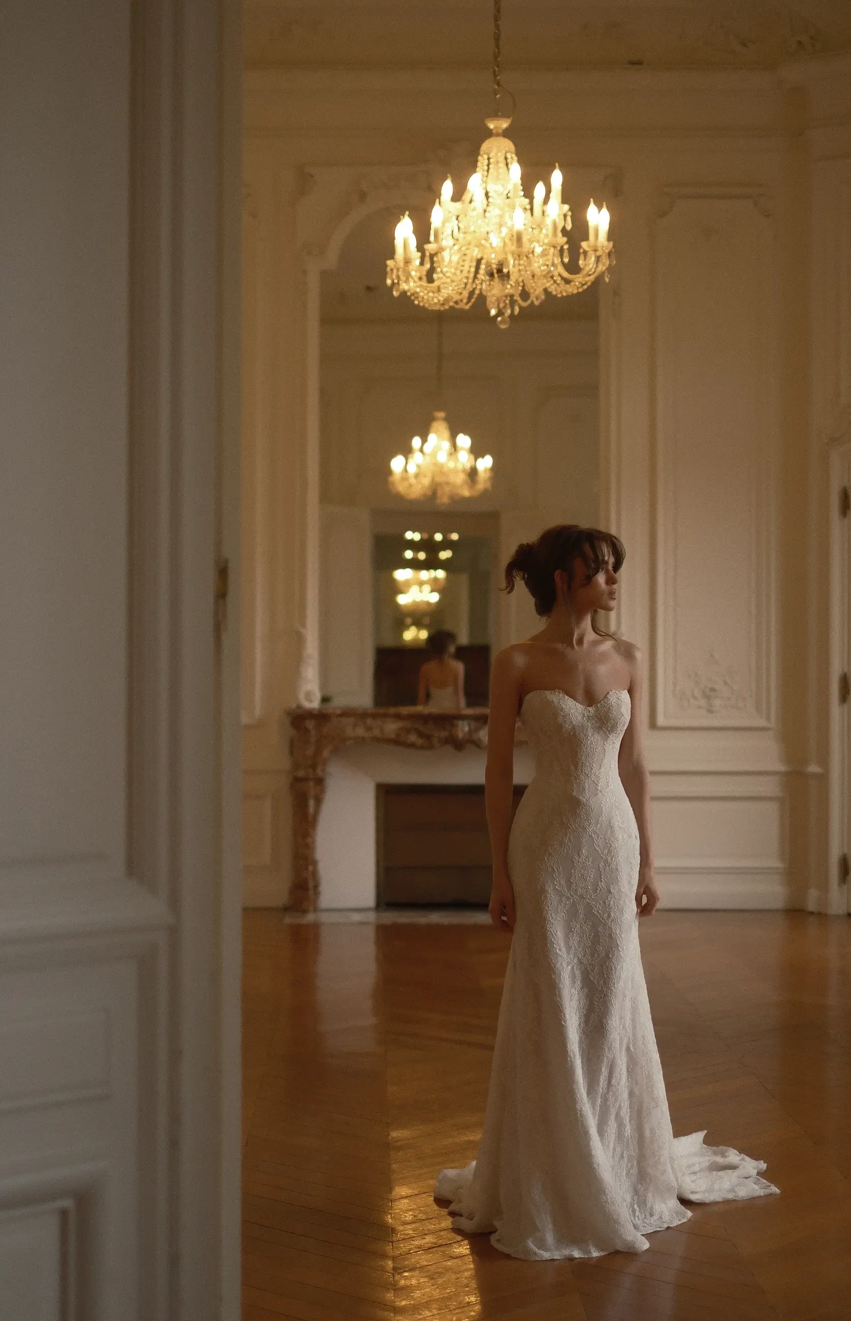 model is wearing a daniel elbaz wedding dress