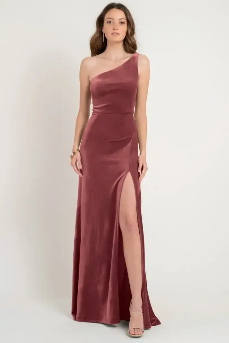 model is wearing a cinnamon colored bridesmaid dress