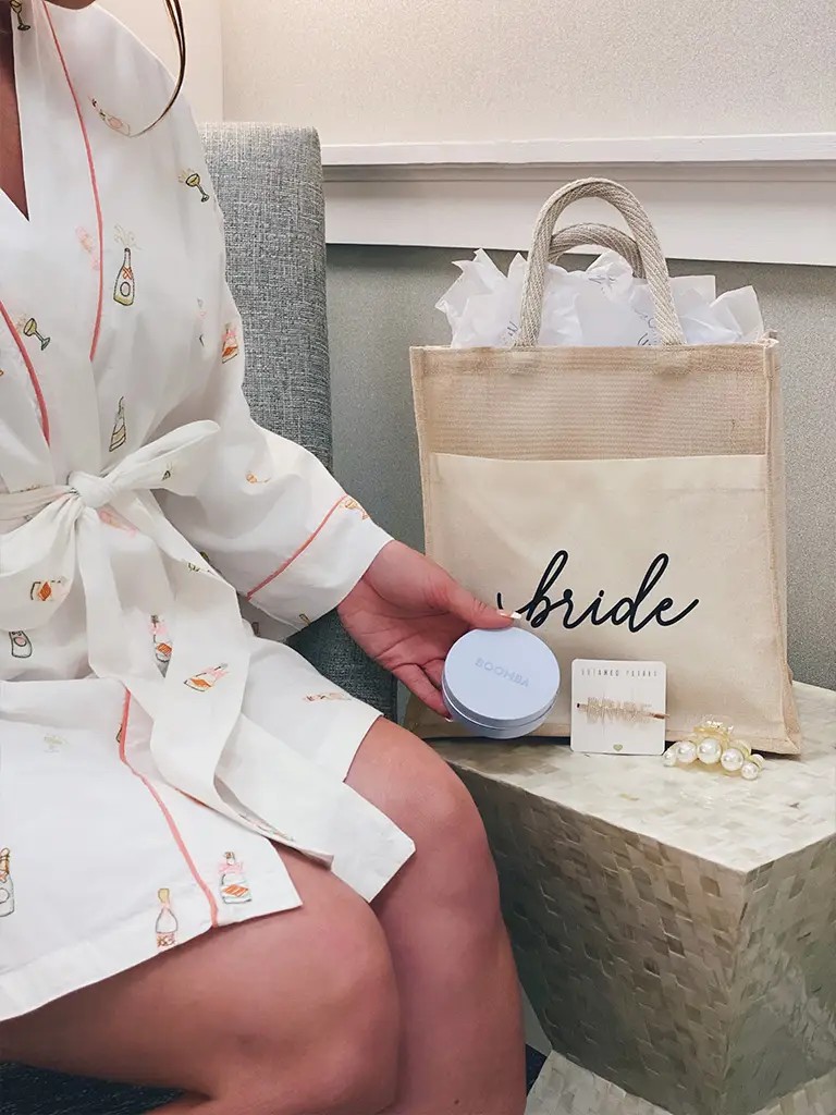 Photo of bride holding bridal goodies